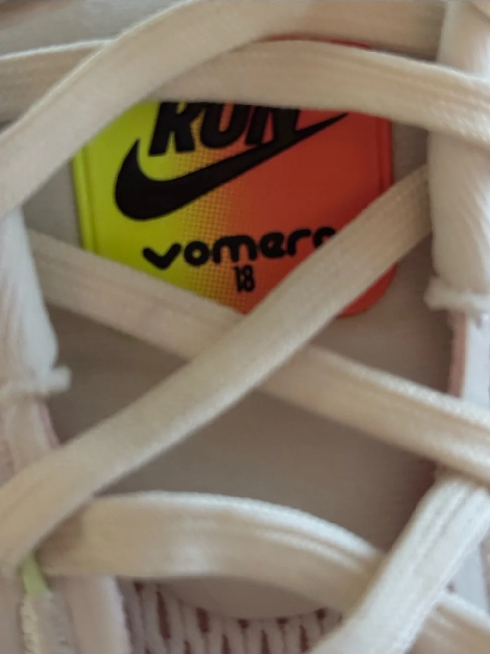 Nike White Volmero 18 Running Shoes with Neon Yellow-Orange Accent